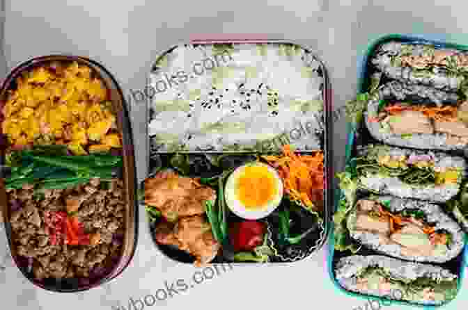 A Bento Box Filled With Fish, Rice, Vegetables, And Fruit The Big Manga Cookbook For Young: Japanese Bento Boxes Main Dishes