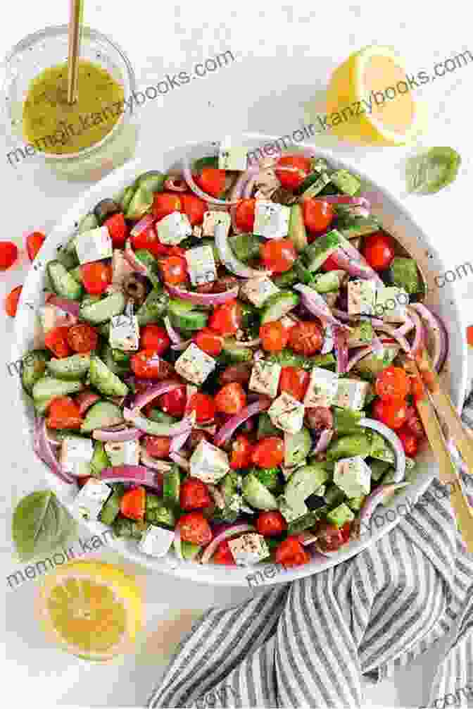 A Greek Salad Made With Cucumbers, Tomatoes, Onions, Feta Cheese, And A Lemon Oregano Dressing Salad: 25 Delicious Salad Recipes (For Those Who Like Salads Salads Recipes Salads To Go Salad Cookbook Salads Recipes Cookbook Salads For Weight Loss Salad Dressing Recipes Salad Dressing)