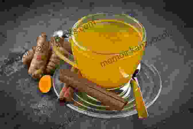 A Photo Of A Steaming Cup Of Turmeric Tea Healing Spices: 50 Wonderful Spices And How To Use Them In Healthgiving Foods And Drinks