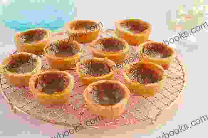 A Plate Of Butter Tarts, A Canadian Dessert Consisting Of A Buttery, Sugary Filling Encased In A Flaky Pastry Shell. Canadian Dishes You Need To Try Out: Popular Recipes Of All Time: Canadian Recipes Food Network