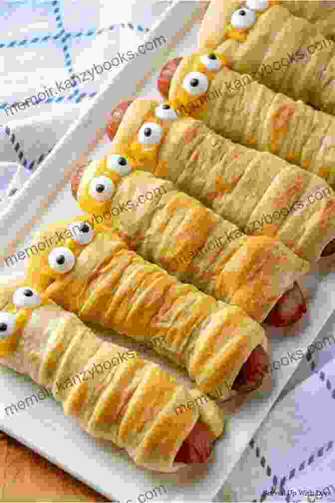 A Plate Of Mummy Dogs, Crescent Roll Dough Wrapped Around Hot Dogs, Baked To Golden Brown And Decorated With Mustard Best Of Recipes For Halloween Parties: A Compilation Of 30 + Fun Recipes For Your Party That Adults And Kids Will Enjoy