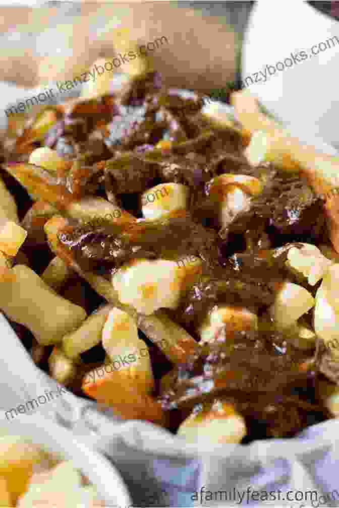 A Plate Of Poutine, A Canadian Dish Consisting Of French Fries, Gravy, And Cheese Curds. Canadian Dishes You Need To Try Out: Popular Recipes Of All Time: Canadian Recipes Food Network