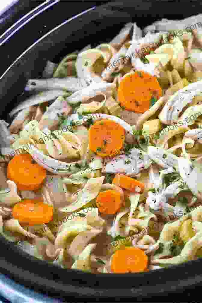 A Steaming Bowl Of Chicken Soup With Noodles And Vegetables. Chicken Recipes: 100 Delicious Chicken Recipes In The World Collected By Popular Chef