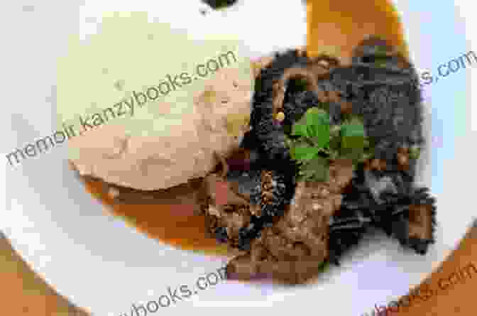 A Traditional Zulu Dish Featuring Meat And Vegetables. The Ultimate African Recipes 2024: Dishes From South Africa