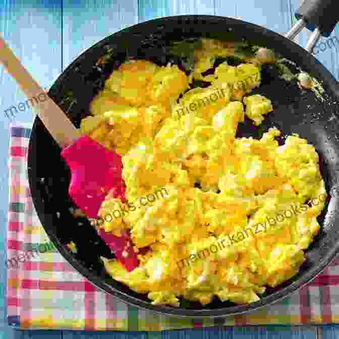 A Vibrant And Protein Packed Dish Featuring Fluffy Scrambled Eggs With Sautéed Spinach. The Gluten Free Good Health Cookbook: The Delicious Way To Strengthen Your Immune System And Neutralize Inflammation