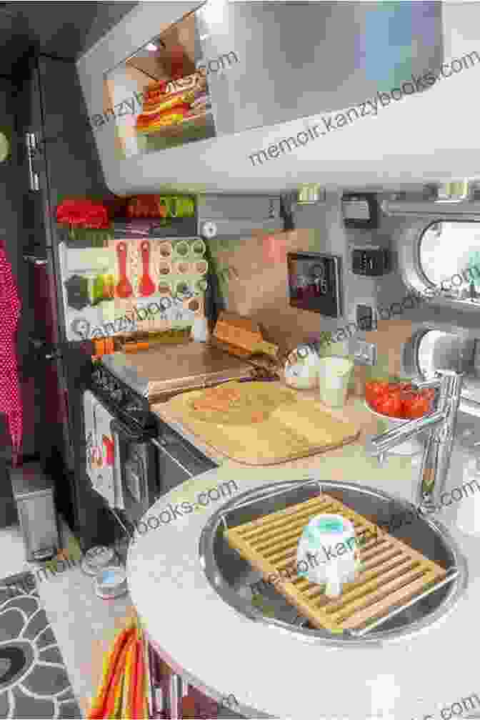 A Well Equipped RV Kitchen, Featuring A Compact Stove, Pots, Pans, And All The Necessary Utensils For Seamless Cooking On The Road. RV Cooking Vol 2 : Best Road Trip Recipes For RV Living And Campsite Cooking (Camper RVing Recipe 3)