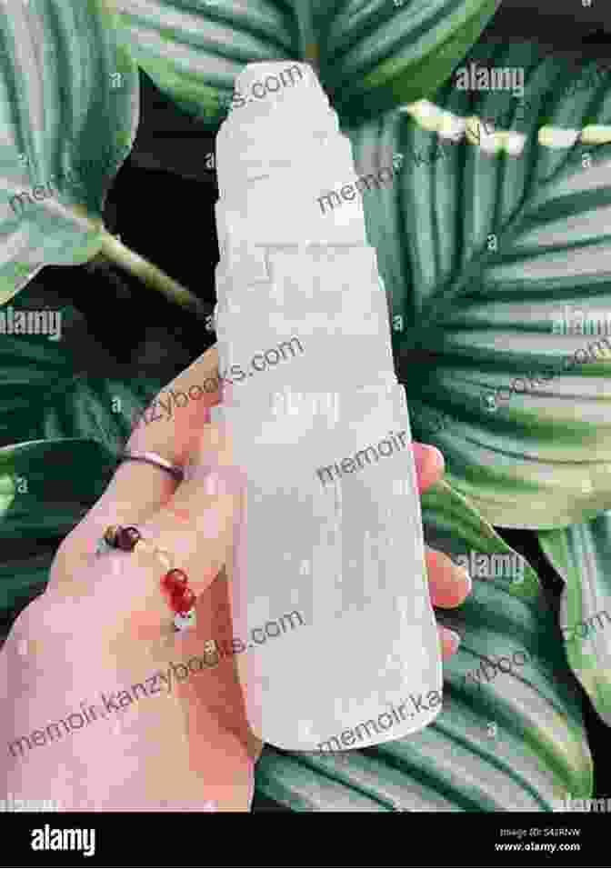 A Woman Holding A Selenite Wand, Demonstrating The Practice Of Crystal Healing, With Various Crystals Scattered Around Her Awakening Your Crystals: Activate The Higher Potential Of Healing Stones