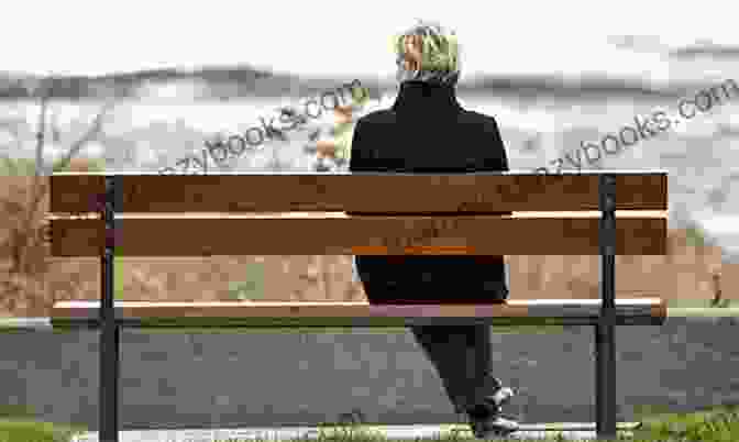 A Woman Sitting On A Bench In A Park, Looking Out At The Water. She Is Holding A Book In Her Hands And Her Expression Is Serene. Embracing What Remains: A Memoir