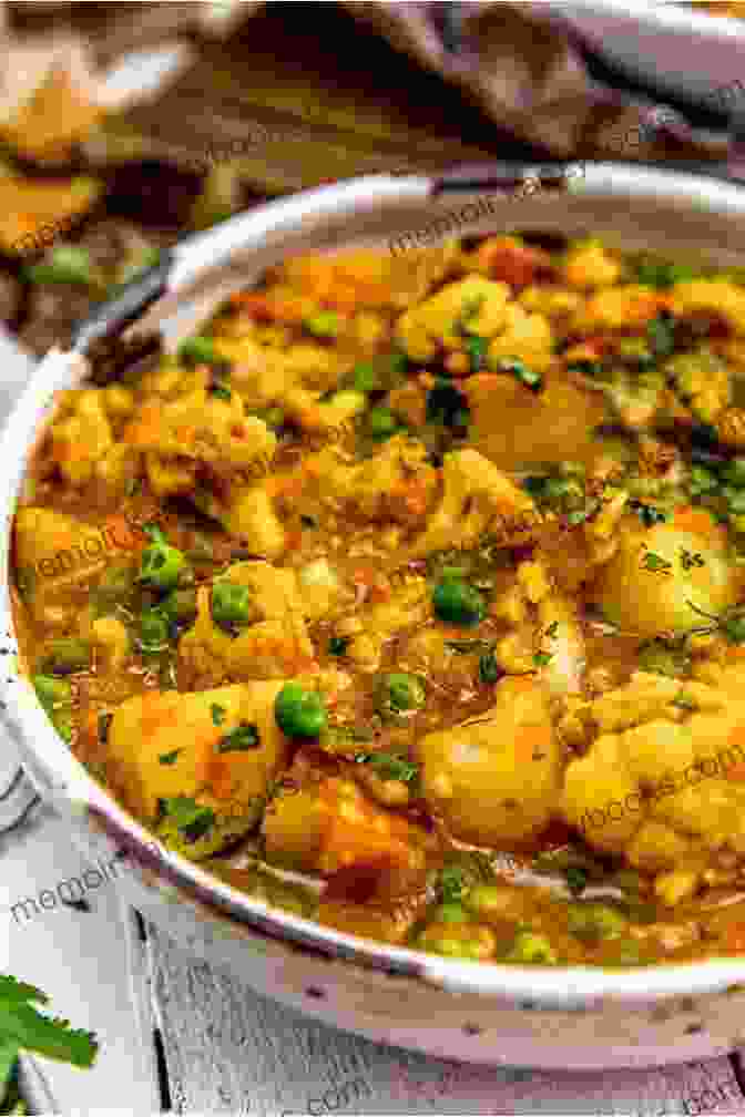 Aloo Gobi: Potatoes And Cauliflower Cooked In Aromatic Spices Easy To Follow Indian Vegetarian Cookbook For Beginners: 250 Healthy And Tasty Recipes From India Indian Vegetarian Food (Vegetarian Cooking 4)