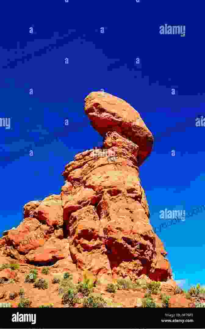 Balanced Rock, A Massive Sandstone Boulder Precariously Perched On A Pedestal Best Moab Arches National Park Hikes