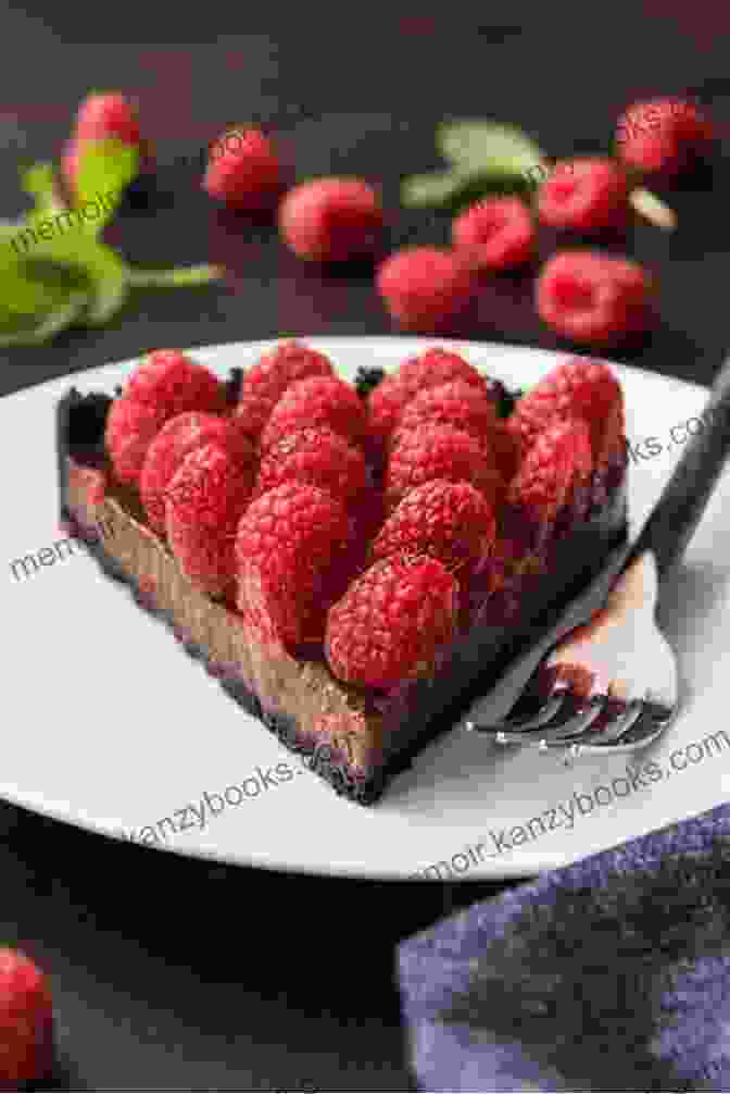 Chocolate Tart With Raspberry Sauce The New Cooking School Cookbook: Advanced Fundamentals