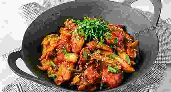 Dakgalbi, The Spicy Stir Fried Chicken Delicacy, Captivates With Its Bold Gochujang Sauce And Tender Vegetables. The Original Korean Cookbook: The Top Picks From The Korean Cuisine