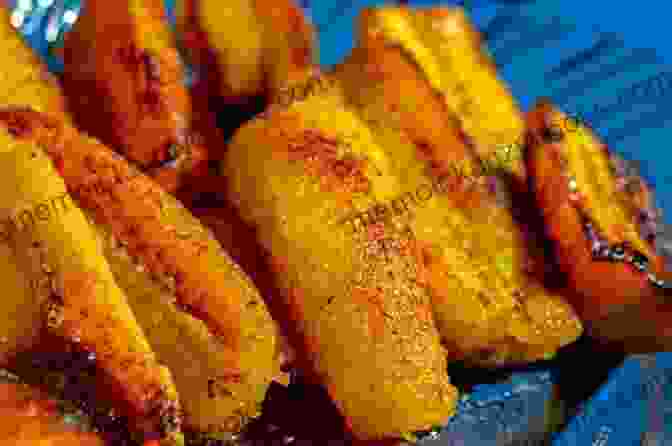 Fried Plantains, A Popular Jamaican Side Dish Made With Green Plantains Peeled, Sliced, And Fried Until Golden Brown Jamaican Recipes 10 Most Treasured Jamaican Cooking Recipes (Jamaica Cookbook)