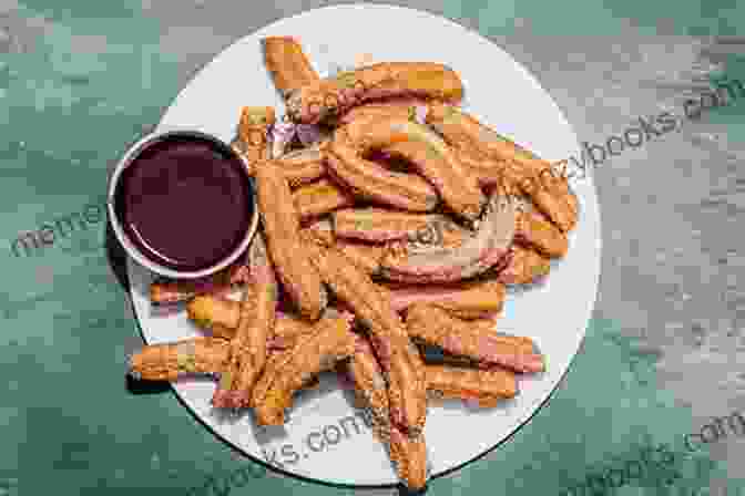 Golden Brown Churros With A Decadent Chocolate Sauce Authentic Mexican Desserts: Must Try Authentic Mexican Desserts Recipes: Mexican Desserts You Ll Want To Make