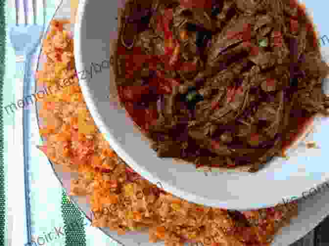 Sample Page From 'Enjoy The Taste Of 100 Traditional And New Cuban Cuisine' Cookbook, Showcasing A Recipe For 'Ropa Vieja' Cuban Cookbook: Enjoy The Taste Of 100 Traditional And New Cuban Cuisine