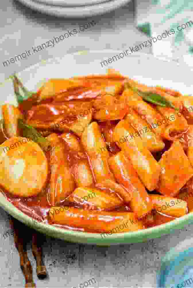 Tteokbokki, The Spicy Stir Fried Rice Cake Delight, Tantalizes Taste Buds With Its Chewy Texture And Gochujang Sauce. The Original Korean Cookbook: The Top Picks From The Korean Cuisine